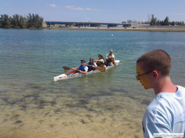 rowers in canoe